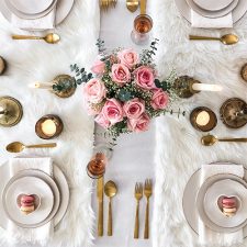 Hoffman Media Presents Winter 2022 White table with pink flowers & gold place settings