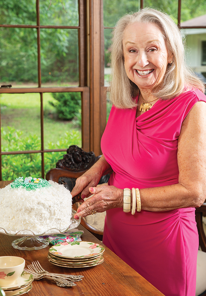 Brenda Gantt slicing a cake