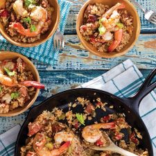 jambalaya in skillet, and served in wooden bowls
