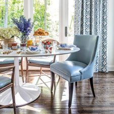 round dining table with blue accents