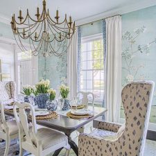 Blue patterned dining room with gold and white finishes