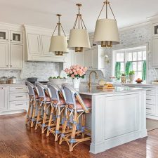 Coastal themed kitchen with gold accents